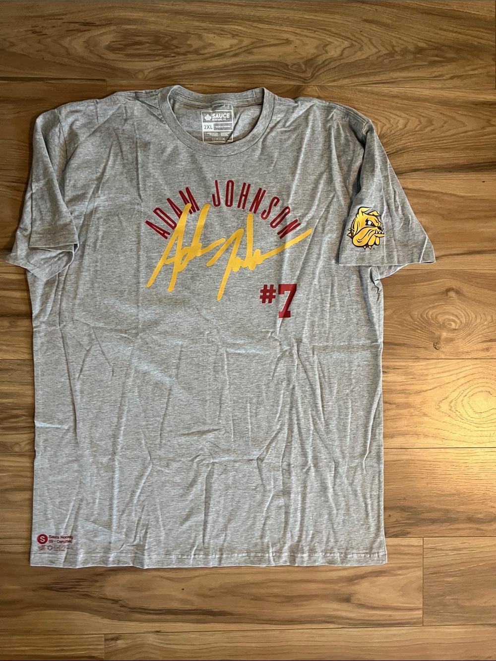 Adam Johnson UMD Bulldog Gray Graphic Tee with Yellow Script